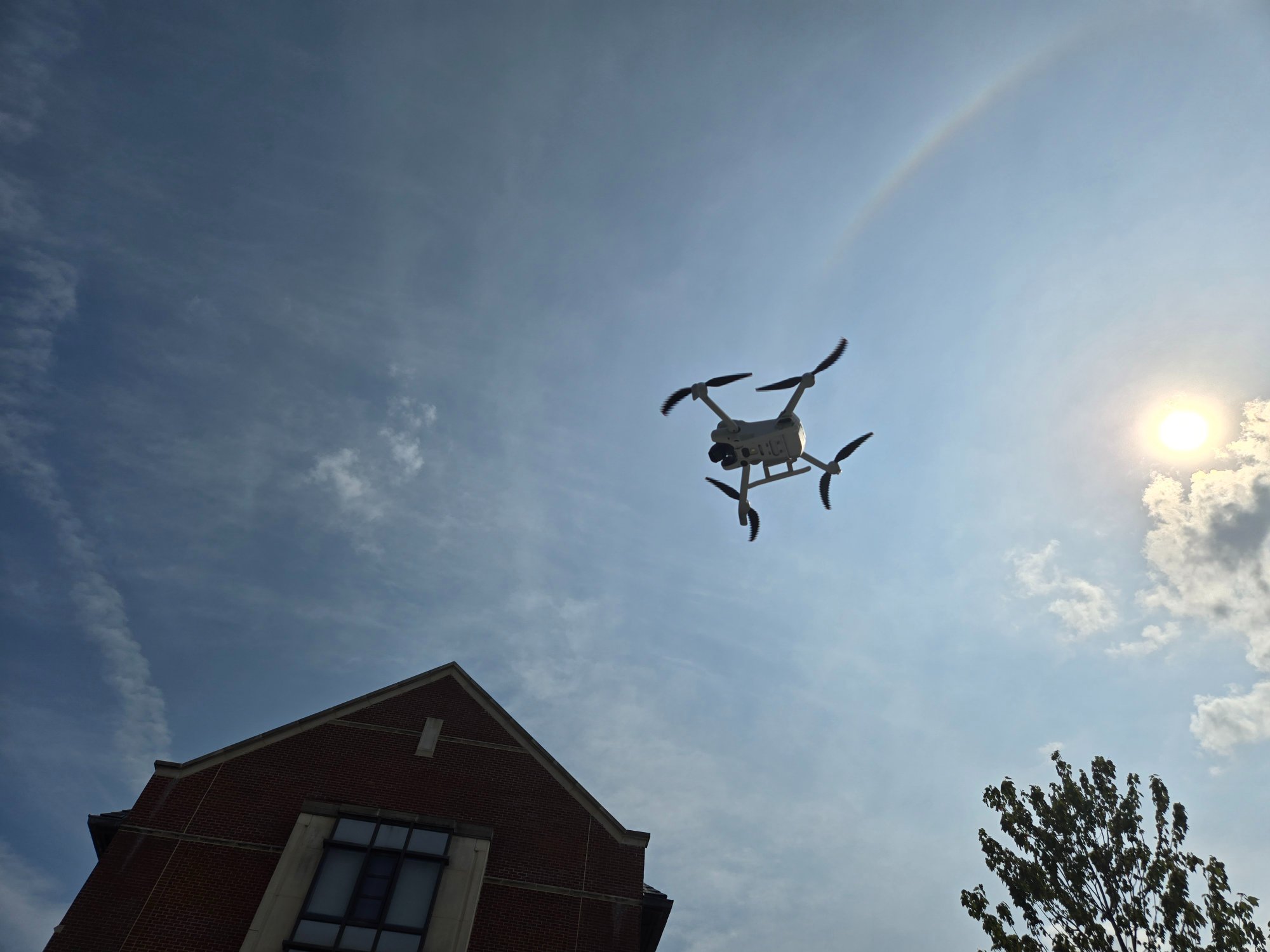Drone silhouette against sun